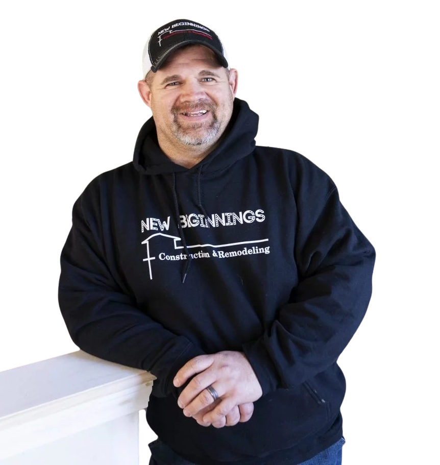 A man with the New Beginnings Construction logo on his sweatshirt. https://nbccomo.com/ Nathan Goen Owner of New Beginnings Construction in Columbia, MO